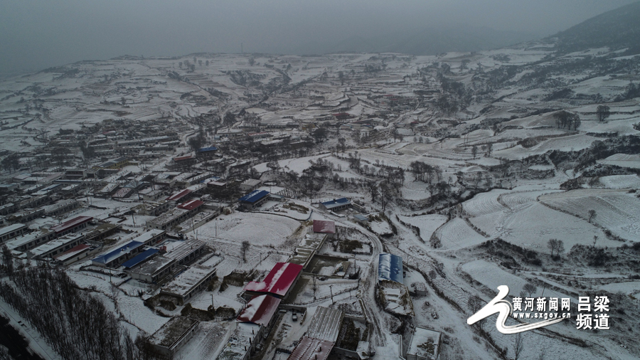 图为中阳县凤尾村雪后航拍图